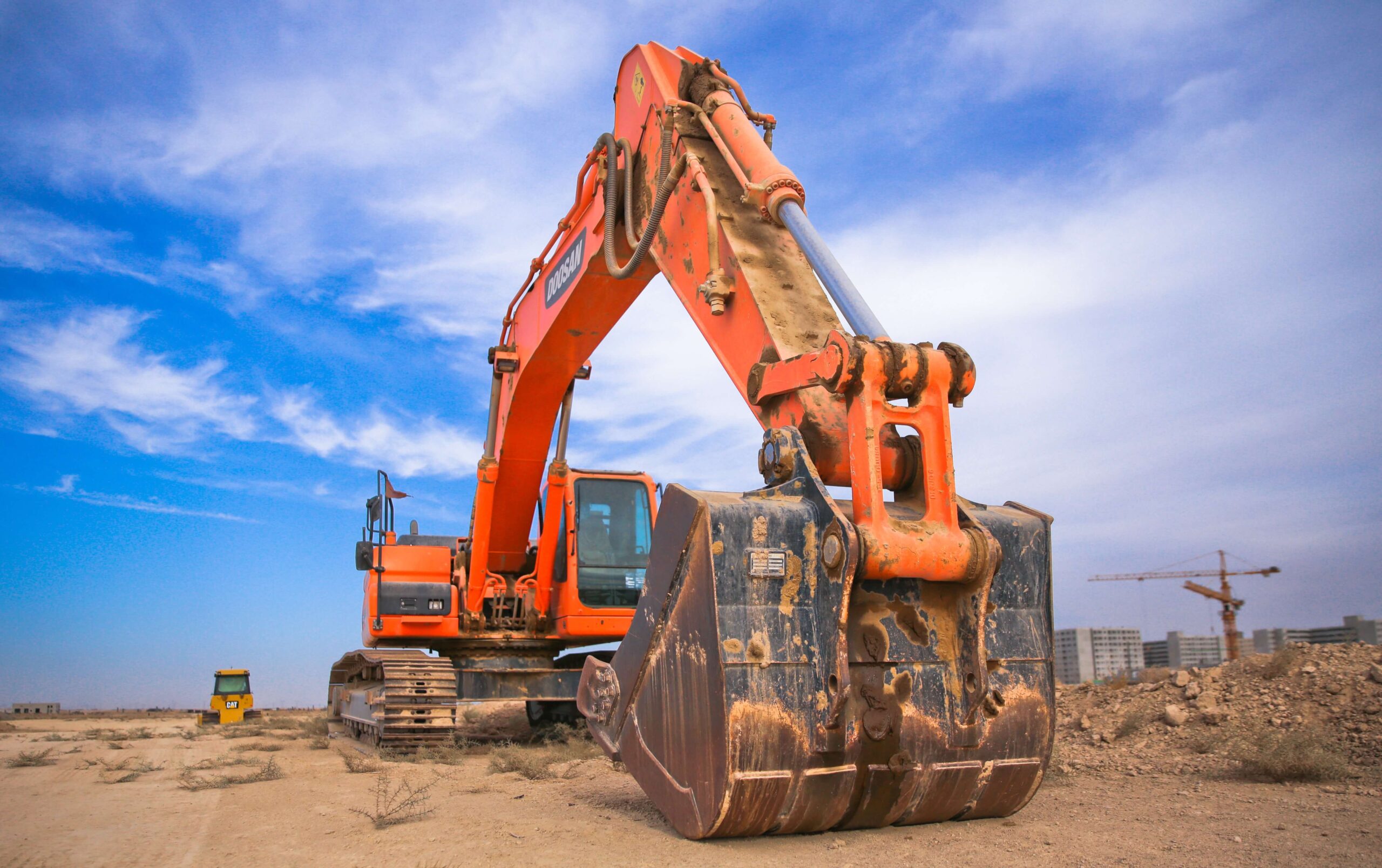 Close Up of Orange Excavation Crane at Next Construction